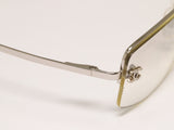 Chanel CC Logo Silver Clear Rimless Rhinestone Sunglasses - Undothedone