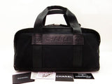 Chanel Sports Black Leather Canvas CC Logo Duffle Bag - Undothedone